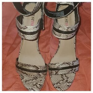 Heeled snake sandals...